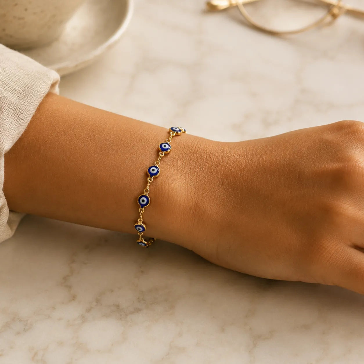 Pulseira Olho Grego Dourada Azul-Escuro