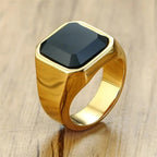 Anel Sinete Pedra Negra Dourado